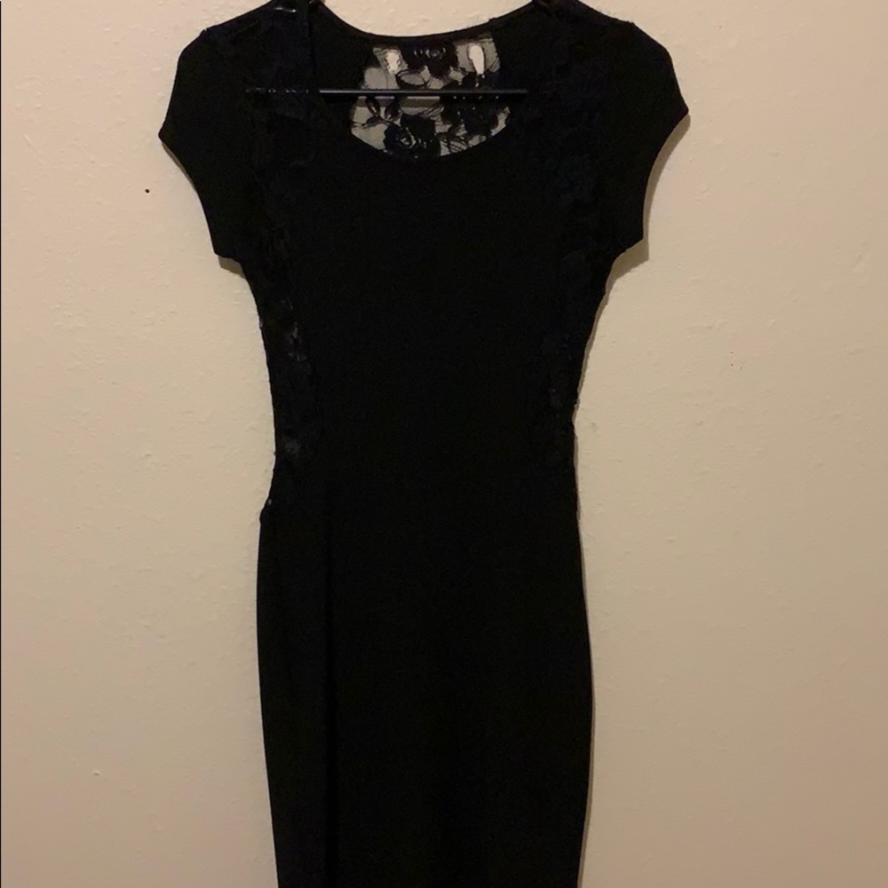 Black fitted lace dress.